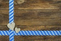 Oktoberfest background with hearts and bavarian ribbon