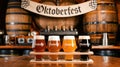 Oktoberfest beer flight selection in rustic brewery setting with barrels Royalty Free Stock Photo