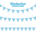 Oktoberfest buntings. Decorations for Oktoberfest. Garland buntings of Bavarian checkered blue flag. Royalty Free Stock Photo