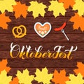 Oktoberfest calligraphy hand lettering on wood background. Traditional Bavarian beer festival. Easy to edit vector template for