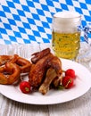 Oktoberfest chicken with radish, pretzel and beer