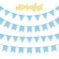 Oktoberfest decorations. Buntings for Oktoberfest. Garland buntings of Bavarian checkered blue flag, and hand lettering Royalty Free Stock Photo