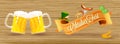 Oktoberfest event concept, two beer mugs, sausage with fork, pretzel, hops, wheat grain and hat on wooden texture background for Royalty Free Stock Photo