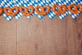 Oktoberfest festival background with pretzel and napkins with bavarian flag pattern Royalty Free Stock Photo