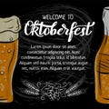 Oktoberfest hand drawn lettering and outline mug of beer for poster, banner, invitation, promo. Chalk art on blackboard background Royalty Free Stock Photo