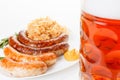 Oktoberfest menu, beer mug, a plate of sausages and sauerkraut