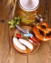 Oktoberfest menu - beer, white sausage, pretzel, radish