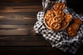 Oktoberfest pretzels on the background of the festival. With Generative AI technology