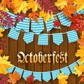Oktoberfest .Traditional German autumn festival of beer background.TGarlands and flags with traditional decor on wooden Royalty Free Stock Photo