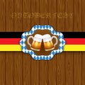 Oktouberfest background. Two mugs of beer on a wooden background.