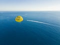 Okurcalar, Alanya, Turkey. Drone view of the wide blue Mediterranean sea with speedboats and a person flying over the Royalty Free Stock Photo