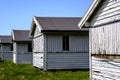 Row Or Line Of Old Derelict Wood Beach Huts