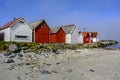 Row Or Line Of Traditional Colourful Beach Huts