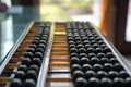 Old abacus and hold electronic calculator. picture financial concept design. Royalty Free Stock Photo