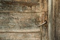 Old abandon house detail - doors closeup with a handle