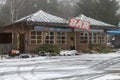 An old abandoned bar on a busy road. Ruin of restaurants in Central Europe Royalty Free Stock Photo