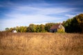 Old abandoned barn in the field autumn season landscape Royalty Free Stock Photo