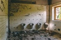 Old abandoned bathroom in a school Royalty Free Stock Photo