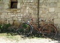Old abandoned bike leaning Royalty Free Stock Photo