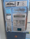 Old abandoned blue coin operated pay phone Royalty Free Stock Photo