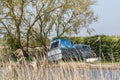 Old abandoned boat beside the river to the Norfolk Broads Royalty Free Stock Photo