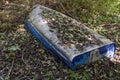 Old abandoned boat upside down in a forest Royalty Free Stock Photo
