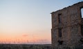 Old abandoned brick building against the sunset sky Royalty Free Stock Photo
