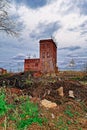 Old abandoned brick building on the background of a rainy autumn sky Royalty Free Stock Photo