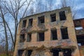 Old abandoned brick building on the background of a rainy autumn sky Royalty Free Stock Photo