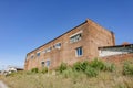 old abandoned brick building with broken Windows Royalty Free Stock Photo