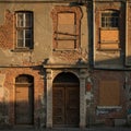 Old Abandoned Brick Building Facade at Sunset Royalty Free Stock Photo