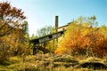 Old abandoned brick factory with a balcony and trees with a lamppost in Almaty Kazakhstan in the fall, autumn