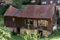 Old abandoned and broken barn with broken windows and roof