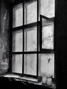 Old abandoned building with broken windows monochrome