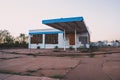 Old abandoned building, likely a gas station, in Holbrook Arizona