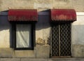 Old abandoned building with metal frame door Royalty Free Stock Photo