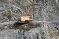old abandoned building of a mining excavator on one of the slope Royalty Free Stock Photo
