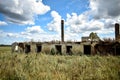 Old and abandoned building near the meadow