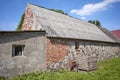 An old abandoned building with roof made of carcinogenic asbestos tiles Royalty Free Stock Photo