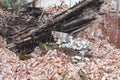 Old abandoned buildings, ruined house. Seismic concept. Ruins after the war. Broken brick dump, demolished houses Royalty Free Stock Photo