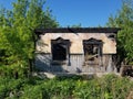 Old abandoned burned down village house Royalty Free Stock Photo