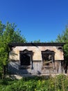 Old abandoned burned down village house Royalty Free Stock Photo