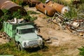 Abandoned cargo truck at a metal dump