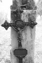 Old abandoned cemetery. A rusty metal cross, the crucifixion of Jesus Christ Royalty Free Stock Photo