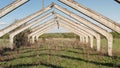 Old abandoned barn. Old abandoned concrete structure farm. Interior of the old ruined abandoned barn for cows. Destroyed Royalty Free Stock Photo