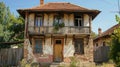 Old Abandoned Countryside House in Disrepair with Overgrown Greenery Royalty Free Stock Photo