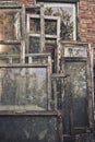 Old abandoned cracked wooden window frames