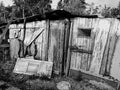 Old abandoned creepy wooden house in Black and White Photo