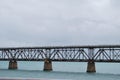 Old abandoned railway bridge over the ocean in the keys Florida