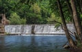 Old abandoned dam in forest